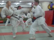 LOL - That's a picture of me (on the right) at my black belt grading in 2006. You don't want to see me a few seconds after this photo was taken :-)